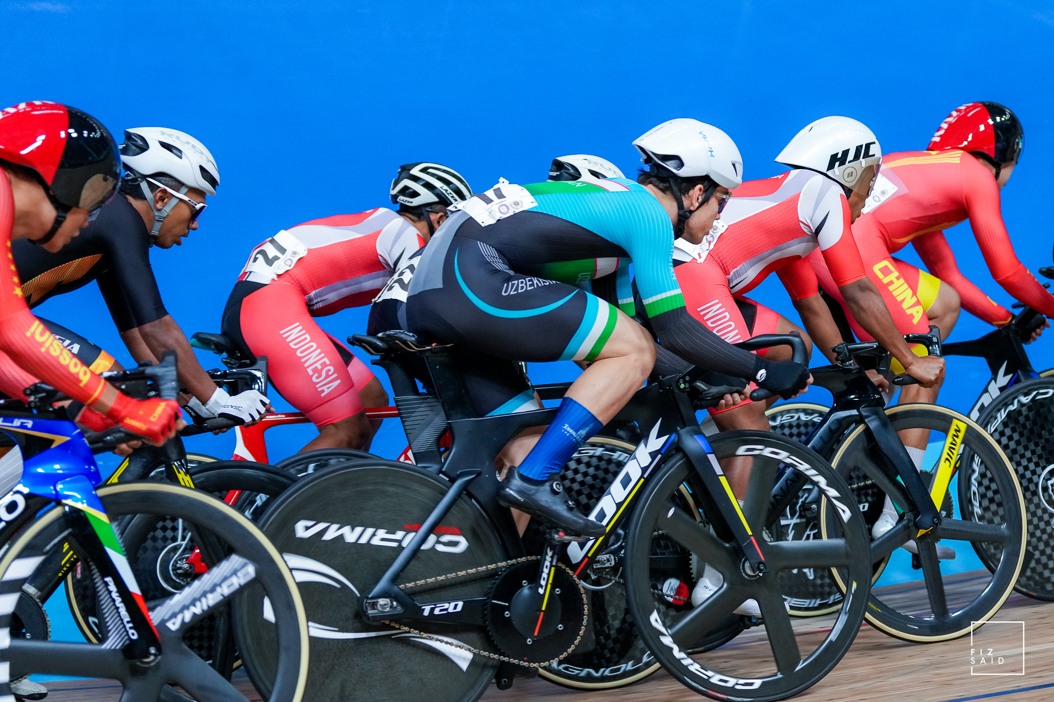 Indonesian cyclists competing on road